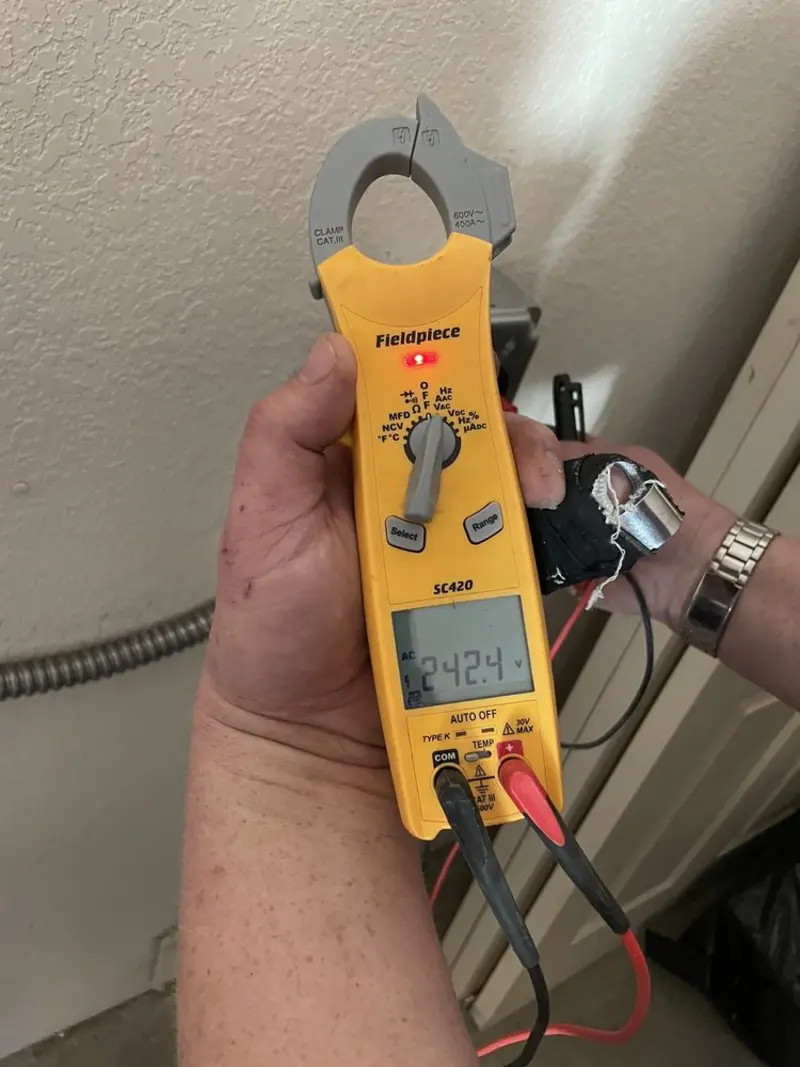 Voltage testing with clamp meter during Generator Installation in Covington